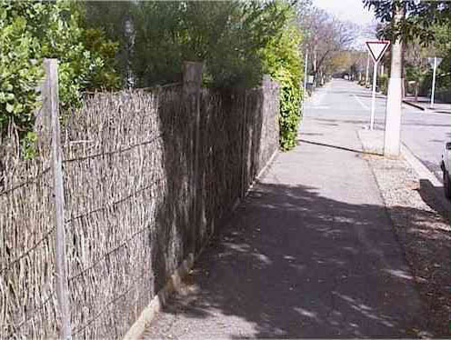 Image:   This fence should be replaced with a new fence comprising galvanised steel posts, reinforced concrete base, machine compressed never-sag panels and either brush roll top or colorbond capping finish.