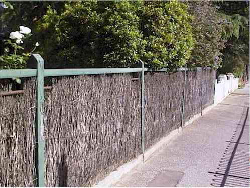 Images:   It is not worthwhile fitting new brush panels to old timber posted fences as the posts rot beneath ground level and need to be replaced.